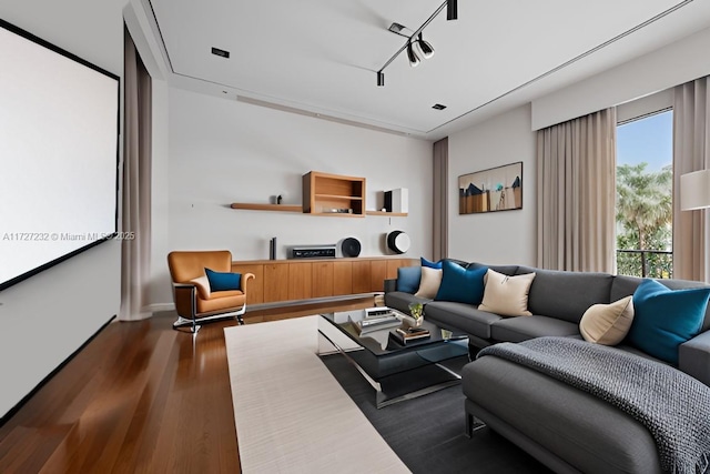living room with baseboards and dark wood finished floors