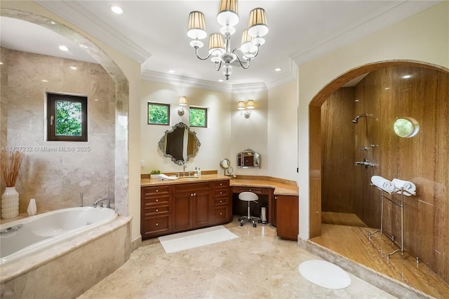 full bathroom featuring ornamental molding, a bath, tiled shower, and vanity