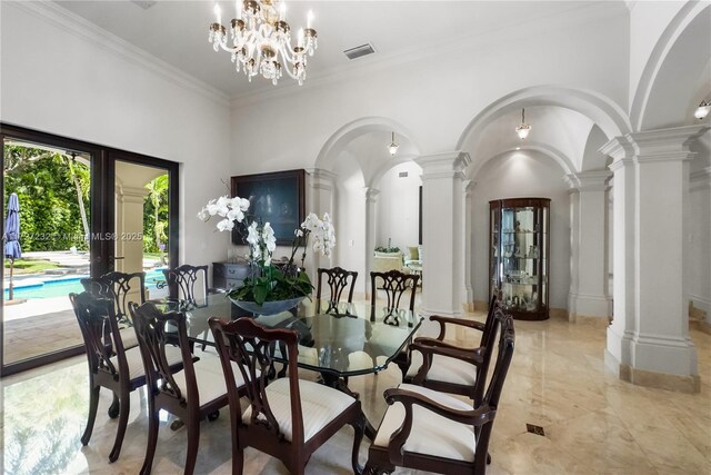 kitchen with decorative light fixtures, sink, appliances with stainless steel finishes, an island with sink, and light stone counters