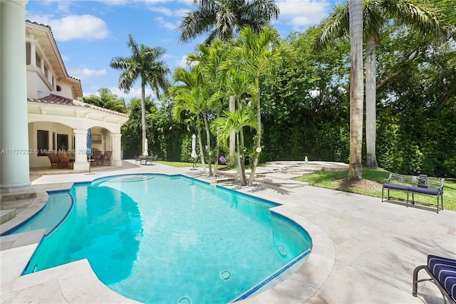 pool with a patio