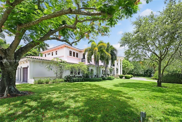 view of yard featuring a garage