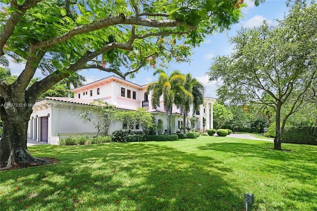 view of yard featuring an attached garage