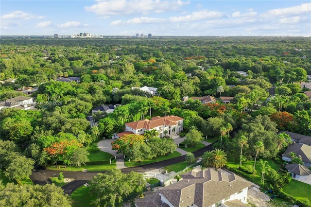 aerial view with a wooded view
