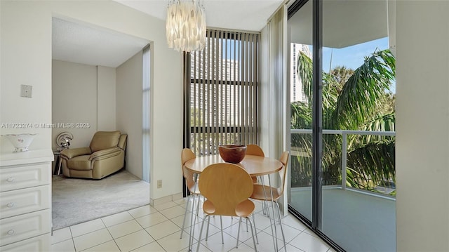 20281 E Country Club Dr Unit M6, Aventura, FL 33180 - dining area with light colored carpet, a chandelier, floor to ceiling windows, and light tile patterned floors