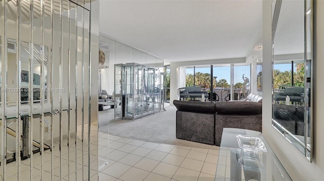 20281 E Country Club Dr Unit M6, Aventura, FL 33180 - tiled living area with carpet
