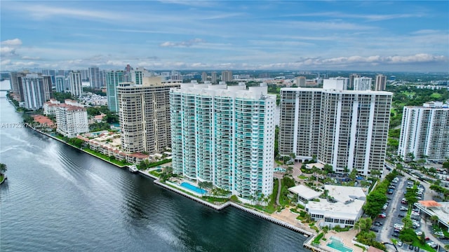 bird's eye view featuring a view of city and a water view