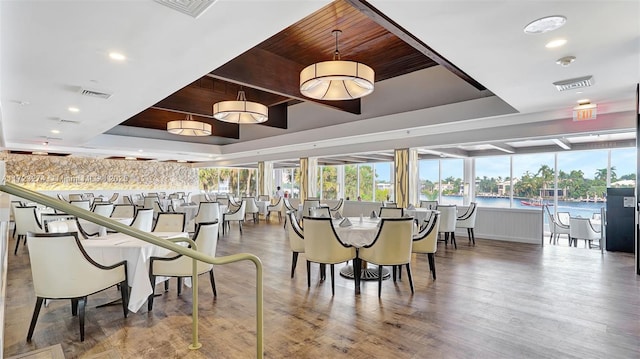 20281 E Country Club Dr Unit M6, Aventura, FL 33180 - dining room featuring a tray ceiling, wood finished floors, wood ceiling, and recessed lighting