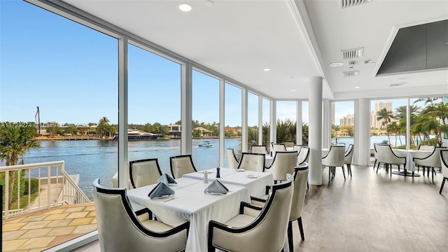 20281 E Country Club Dr Unit M6, Aventura, FL 33180 - sunroom / solarium featuring a water view