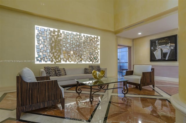 interior space with marble finish floor, visible vents, and baseboards