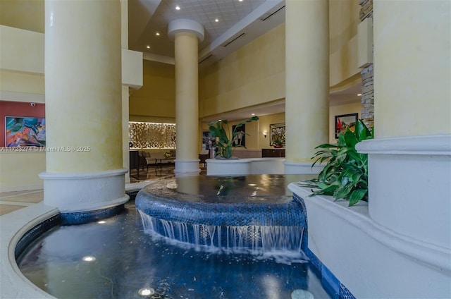 20281 E Country Club Dr Unit M6, Aventura, FL 33180 - lobby with a towering ceiling and recessed lighting