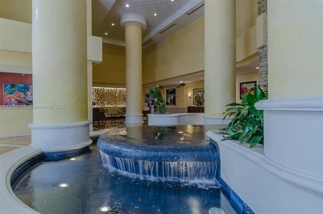 20281 E Country Club Dr Unit M6, Aventura, FL 33180 - lobby with a towering ceiling and recessed lighting