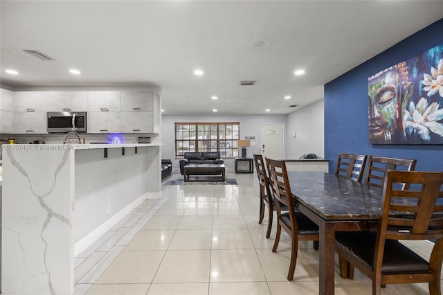 view of tiled dining space