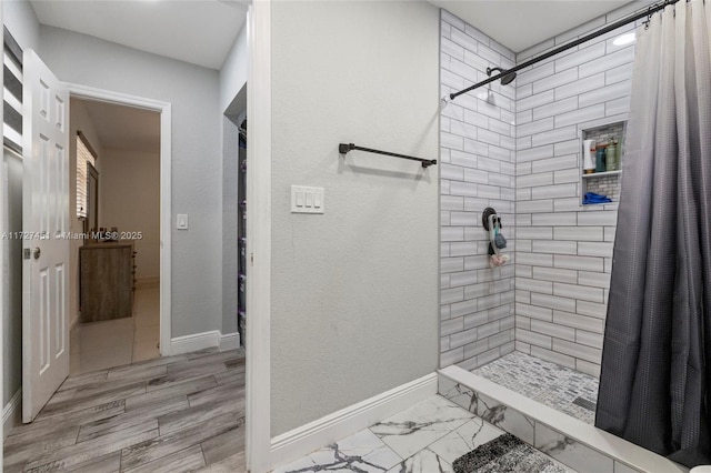 bathroom featuring walk in shower