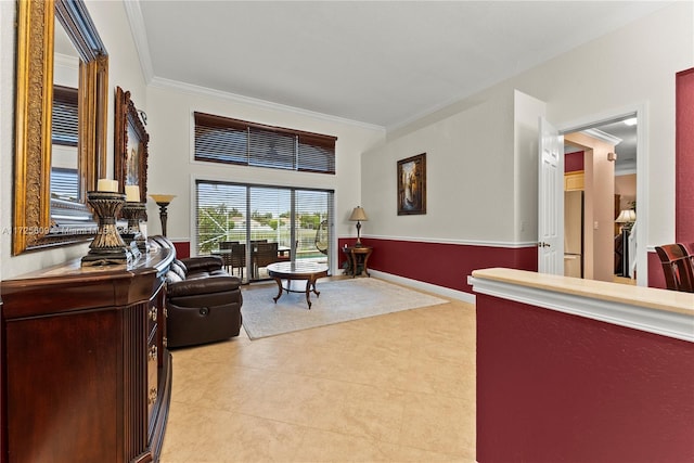 interior space with ornamental molding and light tile patterned flooring