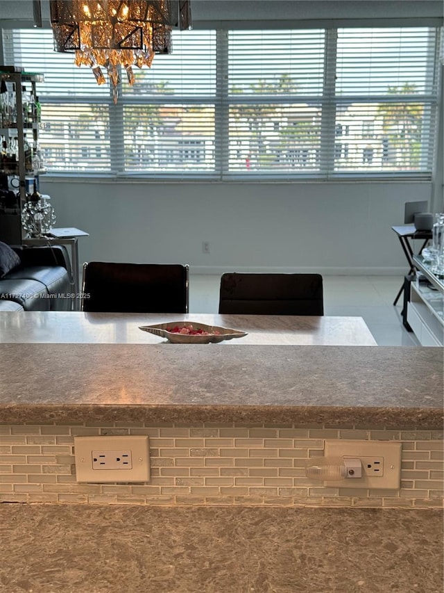 dining area featuring a chandelier