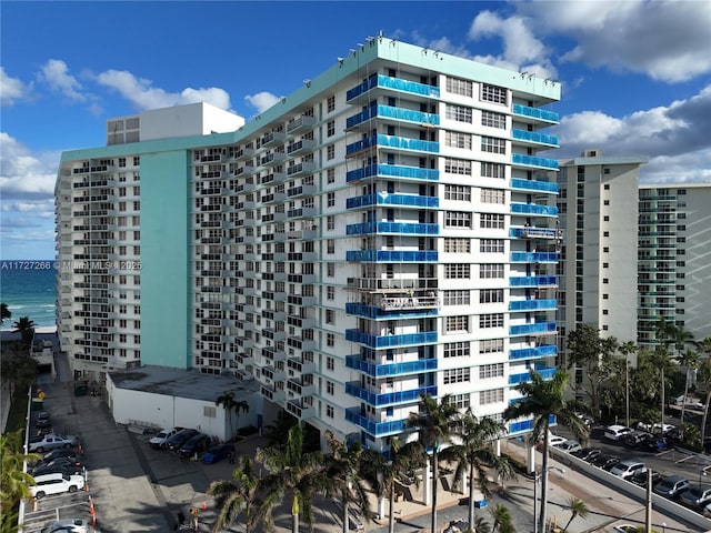 view of property with a water view