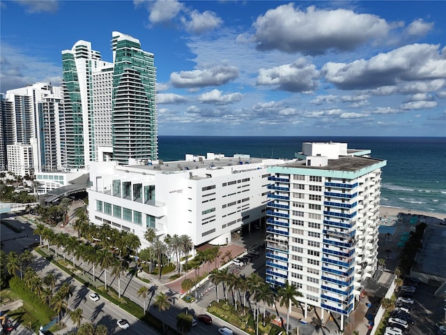 view of building exterior with a water view