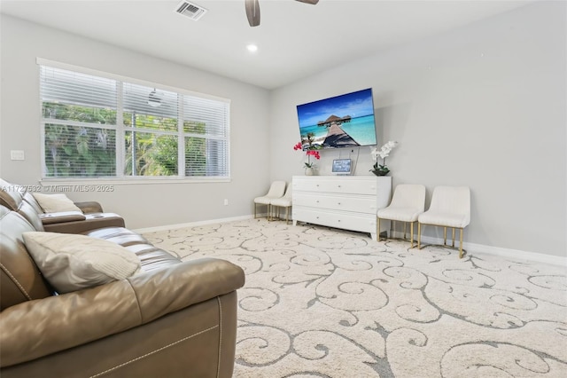 living room with ceiling fan