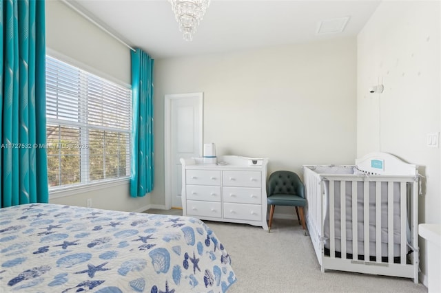 bedroom with light carpet