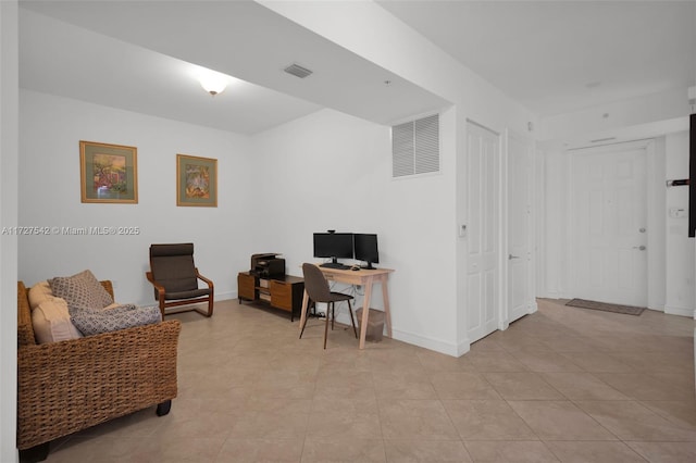 office with light tile patterned floors