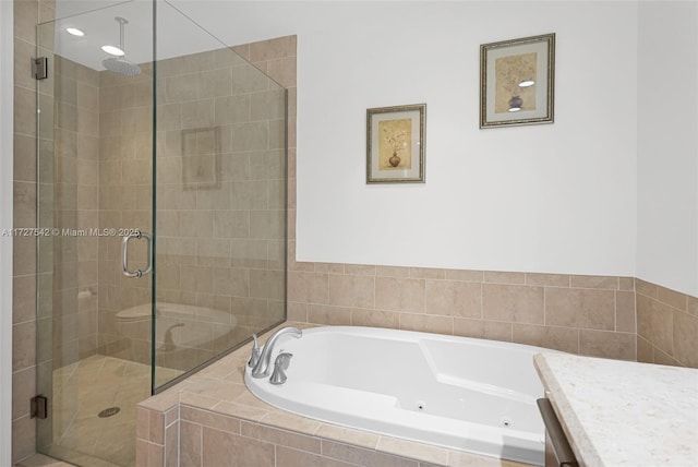 bathroom with separate shower and tub and vanity