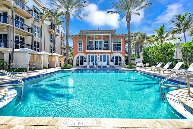 view of pool featuring a patio