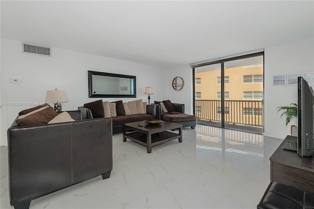 living room featuring expansive windows