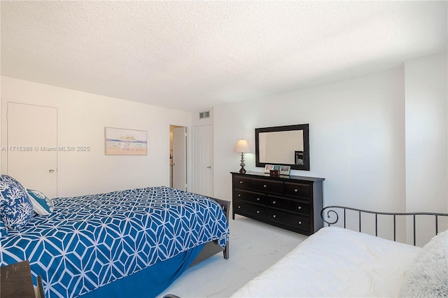 bedroom with a textured ceiling