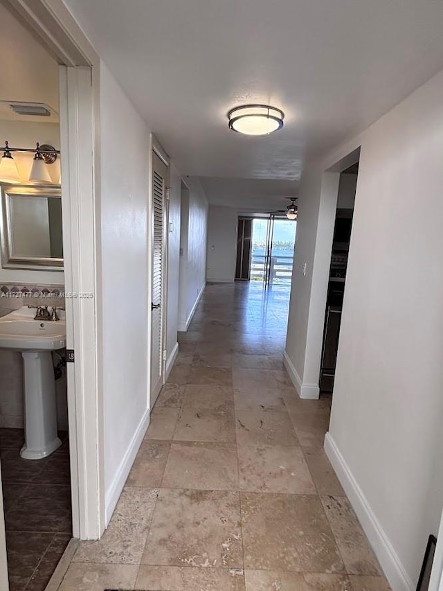1401 NE Miami Gardens Dr Unit 892, Miami, FL 33179 - corridor featuring sink