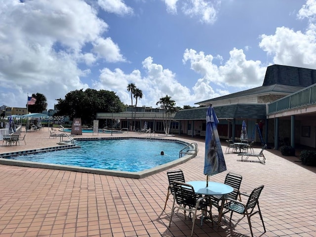 1401 NE Miami Gardens Dr Unit 892, Miami, FL 33179 - view of pool featuring a patio