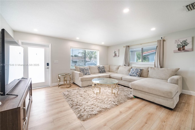 living room featuring light hardwood / wood-style floors