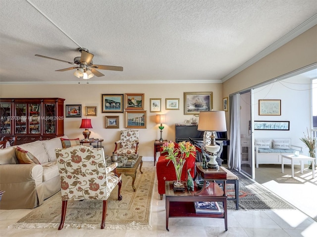 living room featuring ceiling fan, a textured ceiling, light tile patterned floors, and crown molding