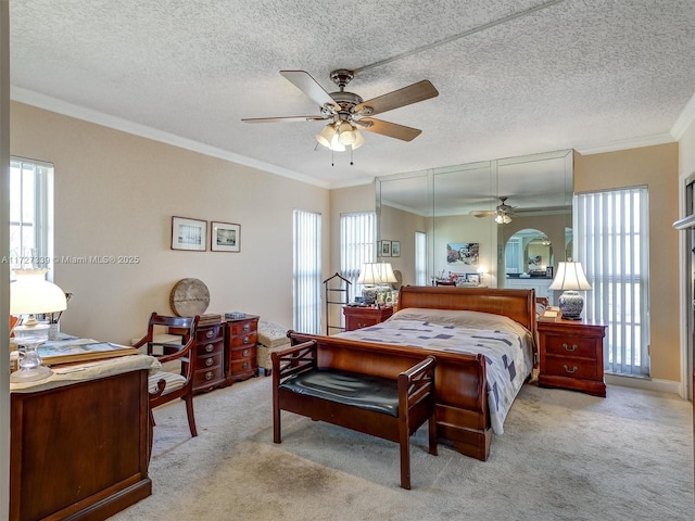 bedroom with light carpet, ceiling fan, ornamental molding, and multiple windows