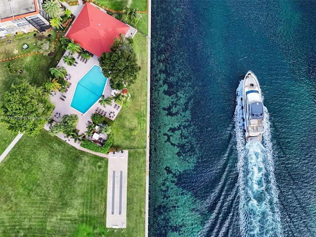 birds eye view of property featuring a water view