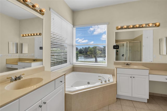 bathroom featuring plus walk in shower, tile patterned floors, and vanity