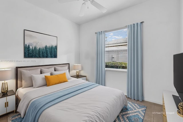 bedroom featuring ceiling fan and light tile patterned floors