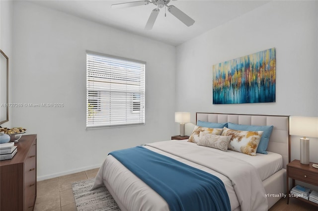 tiled bedroom with ceiling fan