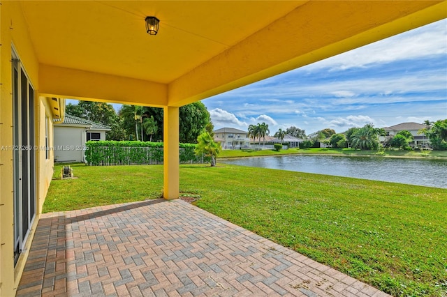 view of patio featuring a water view