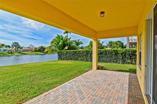 view of patio / terrace with a water view