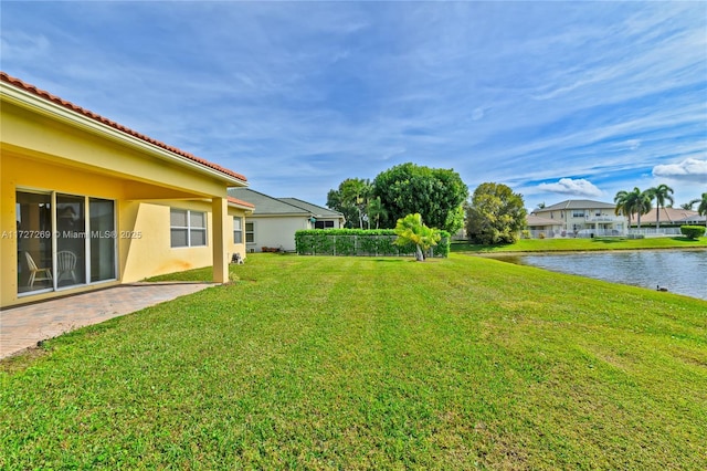 view of yard featuring a water view