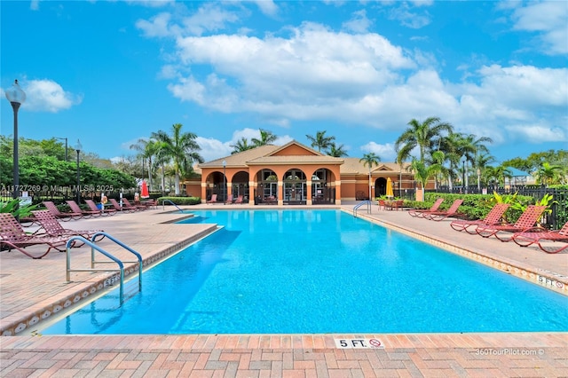 view of swimming pool featuring a patio