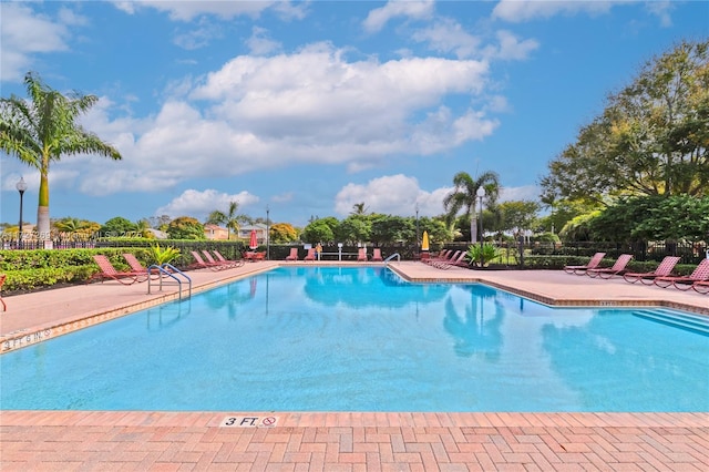 view of swimming pool featuring a patio