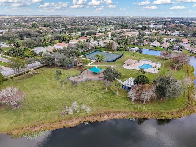 bird's eye view with a water view