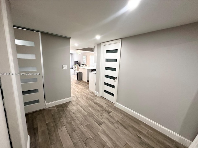 hallway featuring light hardwood / wood-style floors