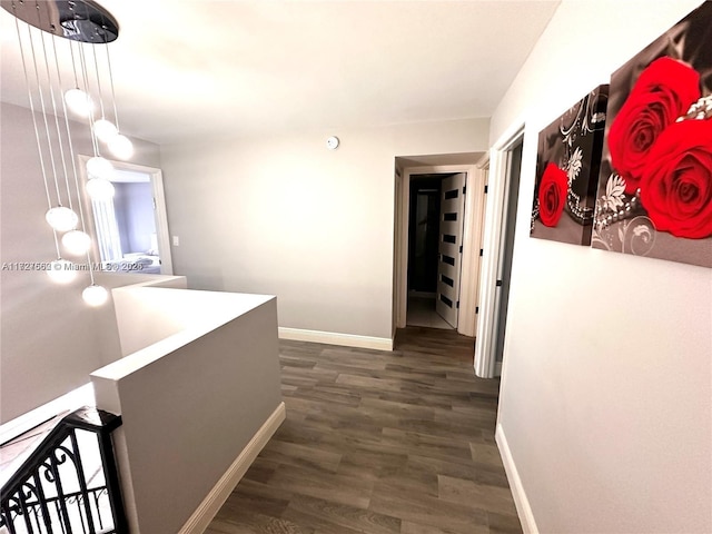 hallway featuring dark wood-type flooring