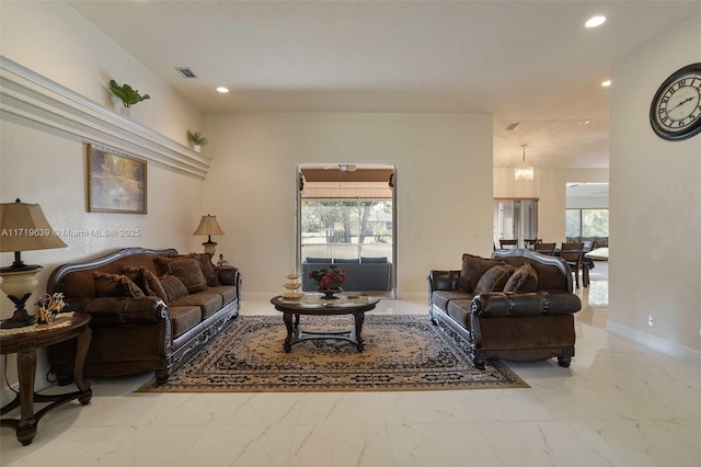 living room featuring a wealth of natural light