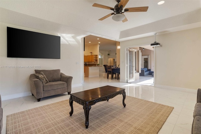 living room featuring ceiling fan