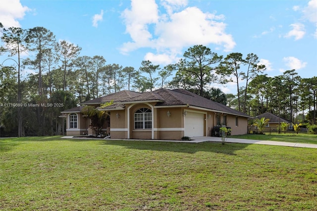 view of front facade with a front lawn and a garage