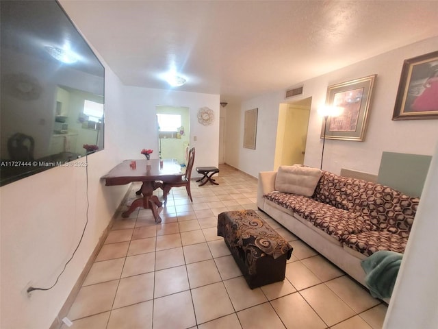 living room with light tile patterned floors