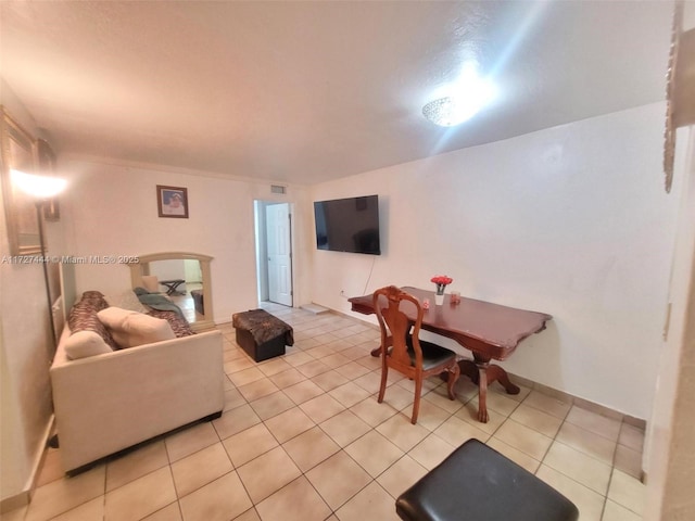 living room featuring light tile patterned floors